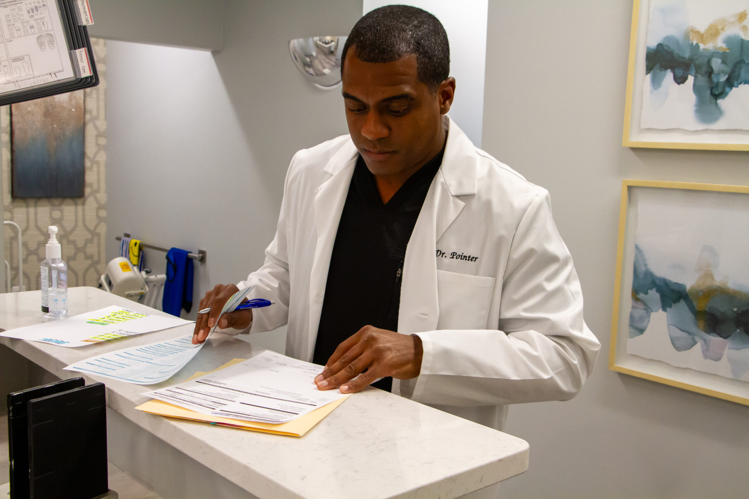 Dr. Pointer writing